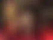 Sexy long crossed legs in glossy pantyhose.