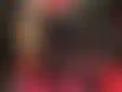 Latex mistress - tight black shiny rubber leggings and sexy red gloves to worship, mistress teases her latex lovers with long shiny hot legs and feet in black rubber. Strapon at the end.