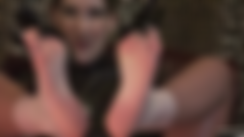 Bare foot fetish and latex - mistress teases the foot lover with her soft bare feet and black shiny latex gloves.