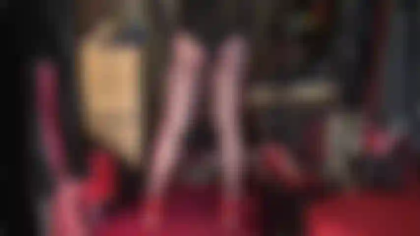 Mistress vivian's knows how to tease your throbbing cock with her incredible body in glossy brown pantyhose, red steel heel pumps and a sexy low cut bodysuit.