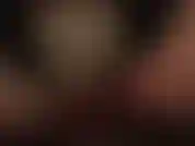 A teasing sexy view in between mistress' glossy pantyhose legs revealing silky satin panties underneath.