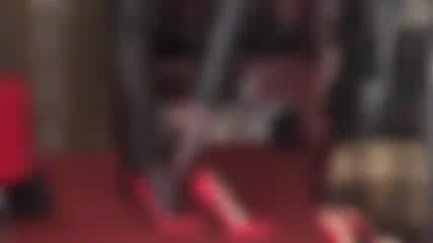 Foot fetish and high heel worship - leather pants and red stiletto heels and pantyhose foot tease.