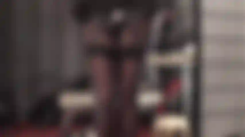 Ooh la la, shiny perfection - Mistress Vivian, dressed in garter stockings and oil shine pantyhose layer with slick black pvc.