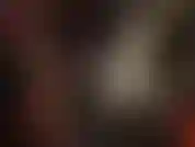 Gorgeous pvc mistress in shiny vinyl long coat, gloves and thigh boots.