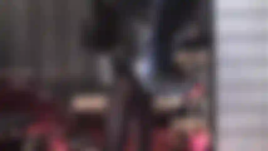 Leather boots worship - mistress vivian, clad in shiny black pvc, demands worship of a pair of leather knee boots and leather platform thigh boots.