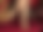 Glossy golden pantyhose legs dangling low leather mules, teasing cock with feet and gloved hands.