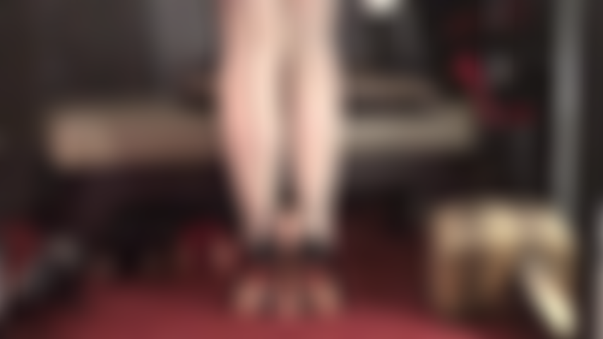 Ivory seamed stocking feet and shiny stilettos own your cock. Indulge in this nylon footjob and heeljob tease.