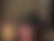 Admire mistress' wonderful ass in a slick black rubber mini skirt and layered glossy fishnet tights and pantyhose.