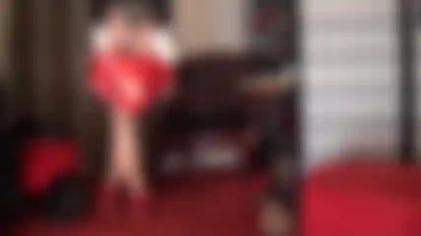 Legs and ass worship - hot red metallic shorts tease in golden glossy pantyhose and seamed black nylon layers with heels and boots.