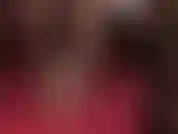 A sexy footfetish tease with red metal stiletto pumps, black pantyhose and a dildo in between for a hot heeljob.