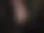 Leather goddess teases with the zipper of her top lowered, granting views on to a pretty lace bra and cleavage.