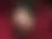 Foot sub delight - crossed ankles dangling red sole pumps giving peeks of mistress' wonderful nylon feet in barely-there sheer glossy pantyhose.