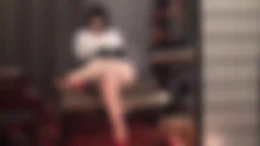 Black hair, black leather and glossy nude pantyhose legs you simply cannot resist.