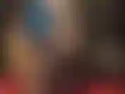 Seductive tease with nylon legs and ass in silky sheer shiny black pantyhose and blue latex.