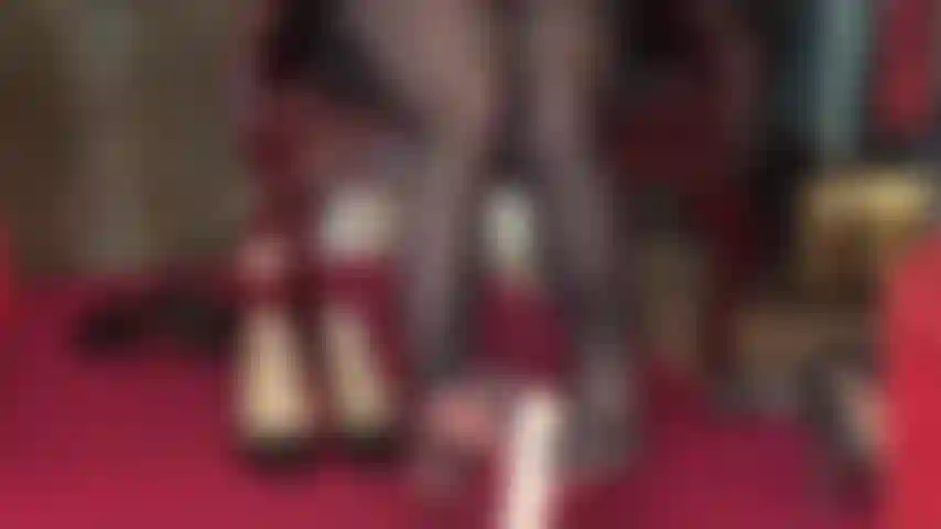 Footjob in black pantyhose with reinforced toes on white uncircumcised dildo.