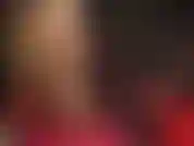 Ass and legs in glossy pantyhose and high heels.