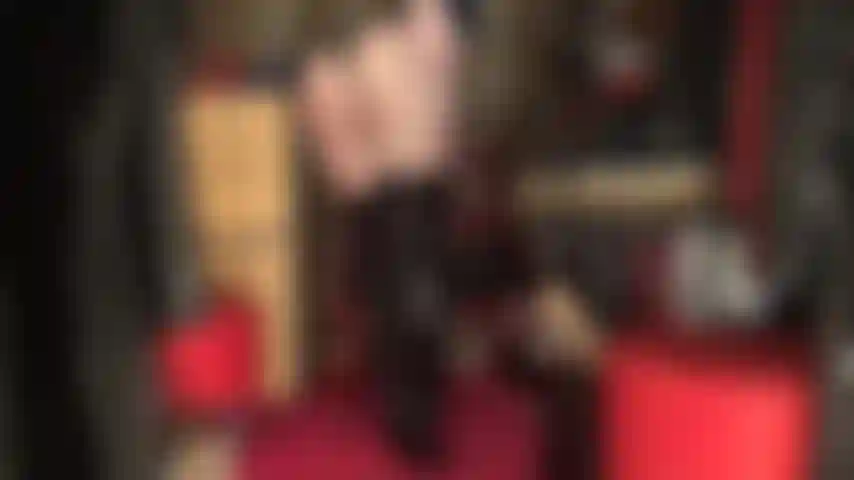 Goddess ass worship in shiny black pvc thong bodysuit and tall boots over black sheer pantyhose.