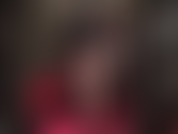 Sexy sensual tease with crossed legs in sheer black pantyhose, with dangling of steel heel pumps.