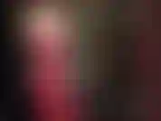 Pegging and strap-on domination with ass worship in super hot red rubber catsuit.