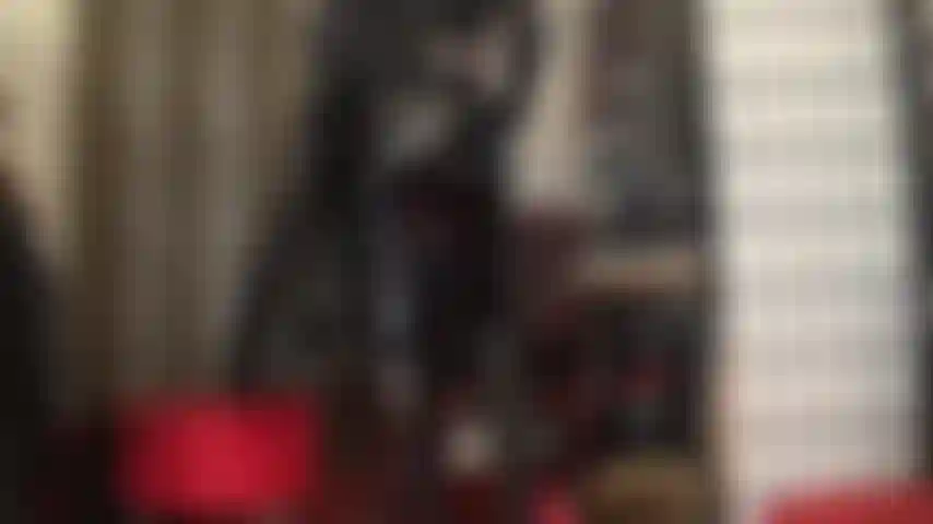 Lots of black leather, shiny pvc skirt and spandex leggings - this fetish outfit is surely going to make your cock jump with joy.