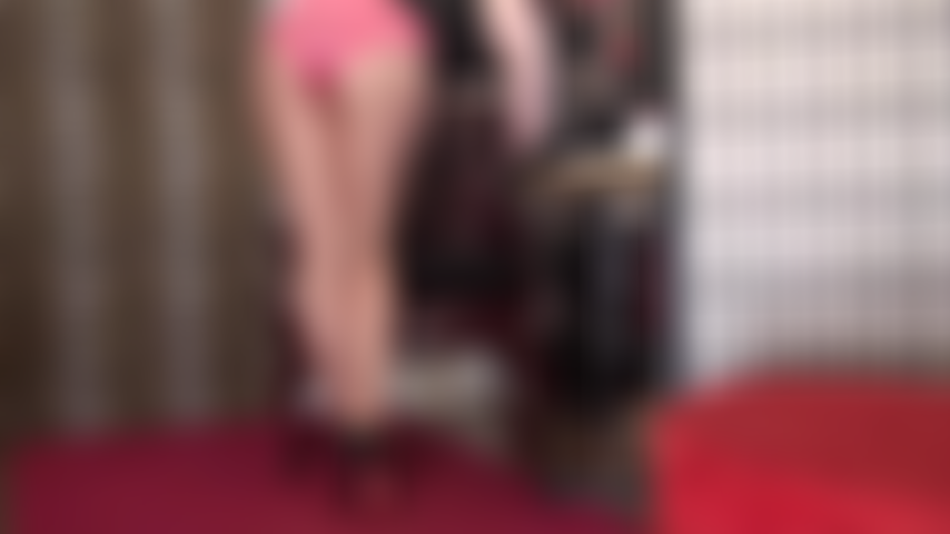 Pink satin panties over glossy tan pantyhose with red sole pumps.