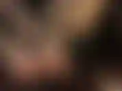 Cum on mistress' beautiful feet with red painted toenails. In this rare clip mistress strokes her black strap-on all over her feet.