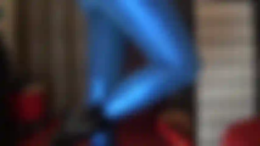 Long legs and sexy ass in shiny metallic blue leggings.