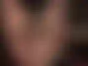 Sensual tease with legs and feet in sheer glossy nude pantyhose and stocking layers.