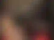 Hot rubber hood to complete a sexy smoke green latex outfit, skirt, blouse and stockings.