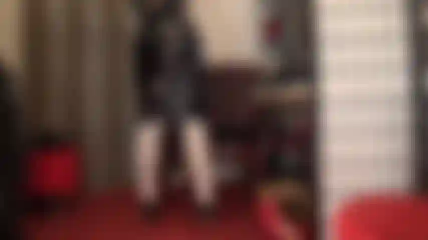 Shiny skirt lover - mistress drives the lover of pvc and vinyl crazy with her shiny black pencil skirt.