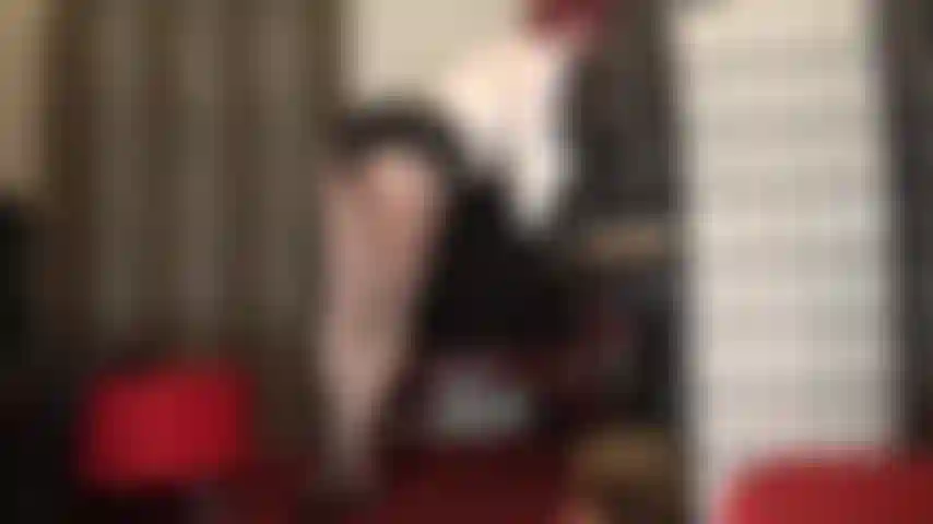 Teasing the leg lover in pretty gray silver glossy pantyhose and high heel mules.