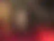 Tight sexy vinyl dress and extra glossy hose on crossed legs you simply cannot resist.