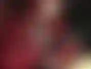 Hand over mouth with leather gloves.