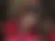 Crossed black pantyhose leg tease.