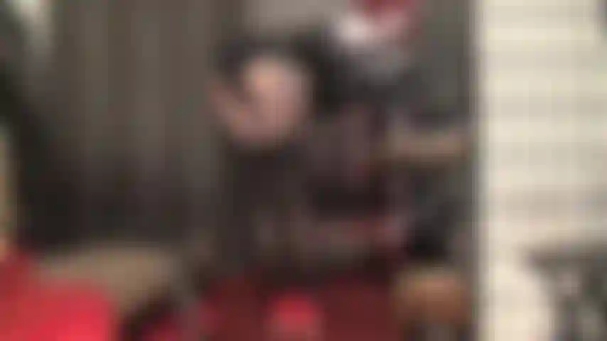 Mistress gently strokes your slave cock with long leather gloves as she teases with her layers of black garter stockings over pantyhose and hot shorts.