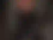 Black latex blouse - mistress adds another layer to her sexy rubber outfit.