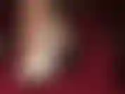 Wearing different colored pumps to tease the foot loving and heel worshipping submissive.