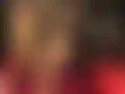 Hot crossed legs fetish in nude nylon bodystocking, paired with metal stiletto heels and sexy gloves.