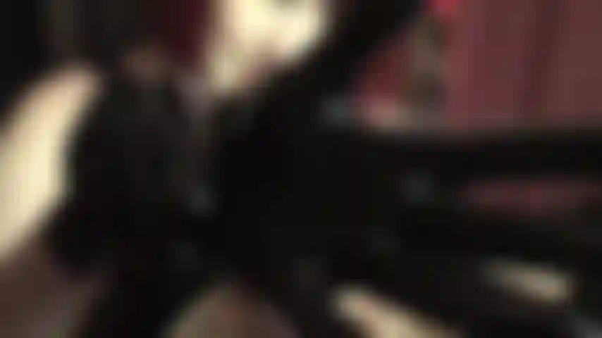 Slick black latex gloves fetish tease.