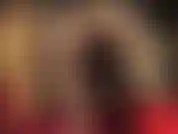 Glossy golden pantyhose legs.