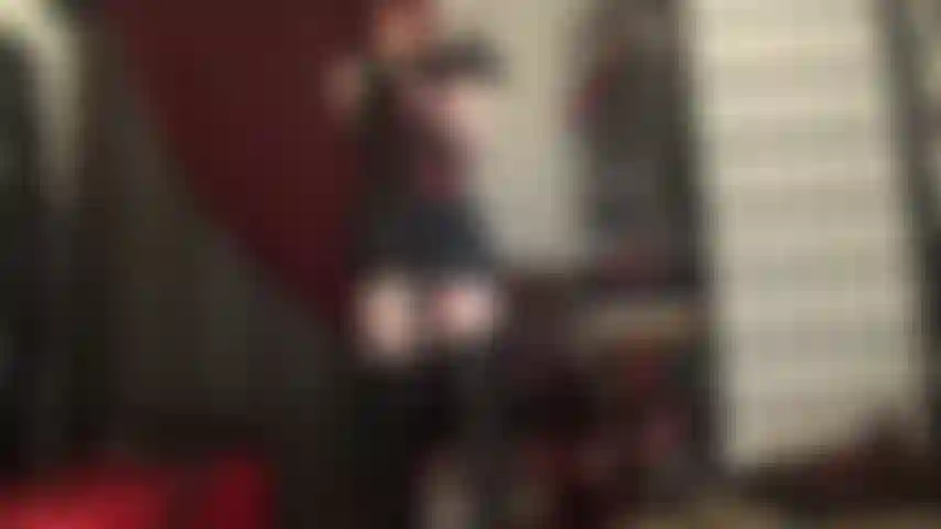 Leather goddess worship - short skirt, long gloves, tight laced corset and tall boots.