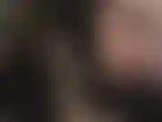 Mistress teases with an extremely sexy and extremely high heel in hand.