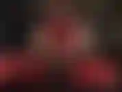 Latex mistress has you hungry for cock - dressed in a hot red rubber catsuit mistress strokes her stryker strap-on, getting you so horny for big dick.