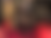 Black leather, shiny pantyhose, sexy boots and a huge black strapon.