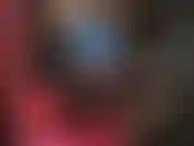 Blue latex dress and shiny thigh boots.