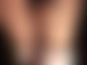 Sexy black satin shorts, glossy pantyhose and satin boots.