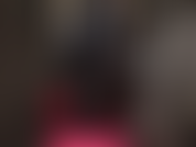 Mistress strokes your aching slave cock in slick black rubber, sexy stockings and garters, paired with long shiny boots.