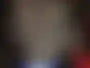 Mistress teases with her curves in hot bodysuit, a pair of vibrant blue satin shorts and tall black shiny boots before teasing cock.