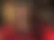 Hot black leather mini skirt and pantyhose with stilettos.