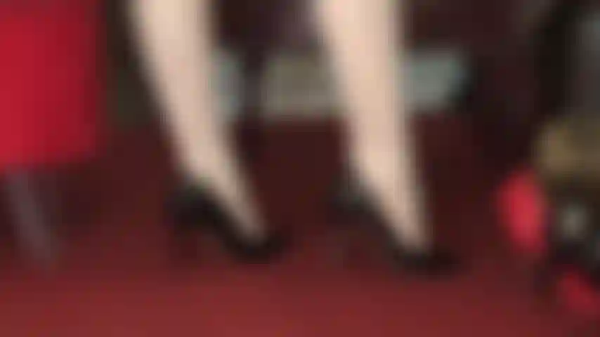 Glossy white hosiery, foot fetish, high heel worship and dipping, shoe play - mistress vivian tempts with her beautiful nylon feet in shiny black pumps.